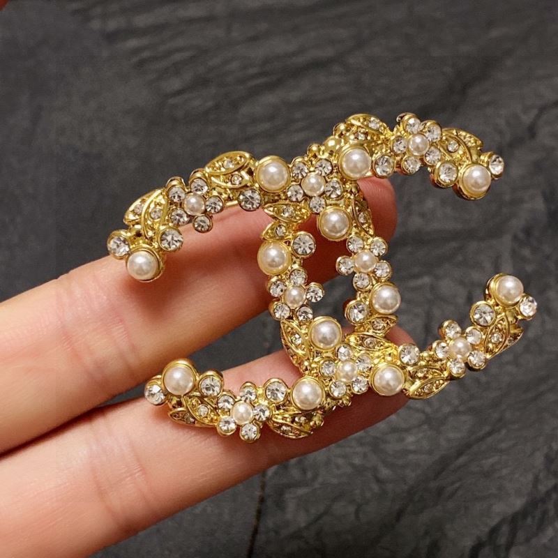 Ch*el brooches